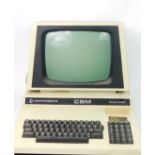 A vintage Commodore CM4032 computer with built in monitor, 43cm high, 43cm wide, 51cm Deep.