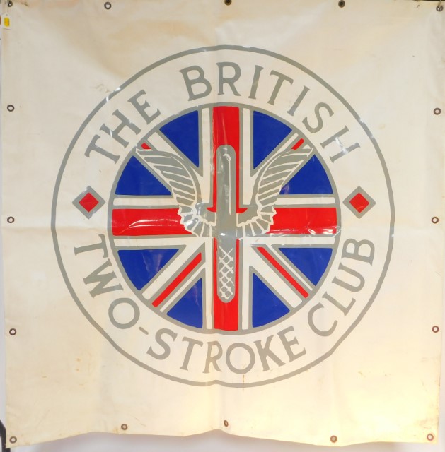 A British Two Stroke Club canvas banner sign, showing the club's motif against a white ground,