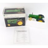 An Ertl Collectibles Precision Classics diecast model of the Model 70 diesel tractor, number 7,