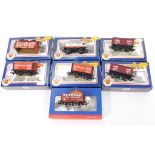 Bachmann OO-gauge rolling stock, including W R Davis & Co seven plank wagon 37-2011K and others