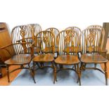 A set of eight (6+2) 20thC ash and elm Windsor chairs, each with pierced splats, the carvers with