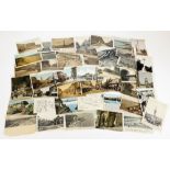 Various postcards, early 20thC townscape, black and white and others to include Cumbria, Square