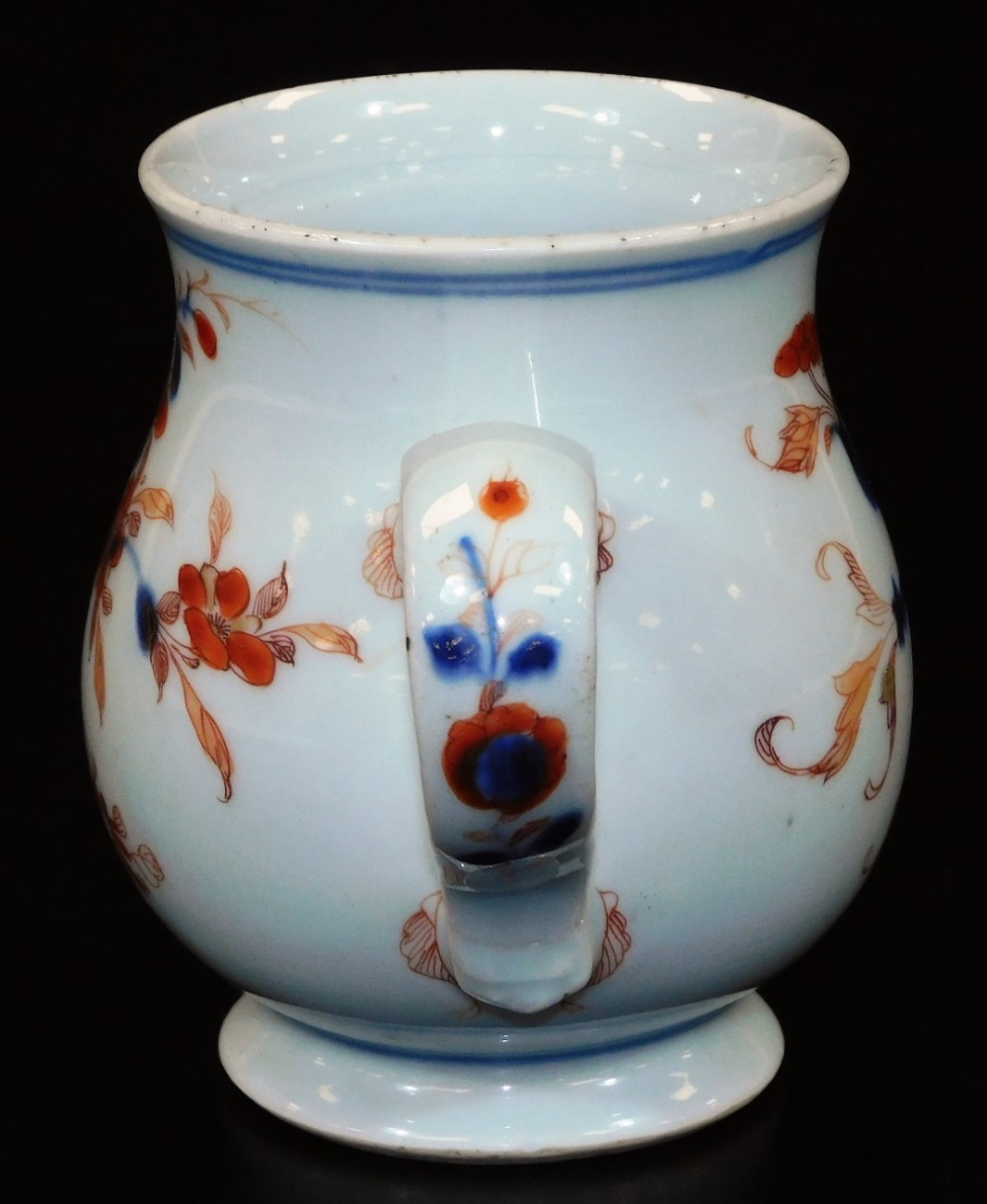 An 18thC Chinese Imari baluster mug with ear handle, predominantly decorated in orange and blue with - Image 4 of 8