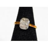 A dress ring, with canted illusion set head, with small diamonds, on a plain shank, size M.