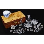 A burr wood box, 23cm wide, with Meissen cabinet cup and various Swarovski and other type crystal