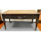 A 19thC mahogany architect's desk, of rectangular form with an arrangement of drawers, on turned