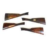 Four various walnut shotgun stocks, 41cm wide. (a quantity)