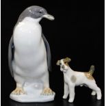 A Lladro pottery figure of a penguin, E-20, marked beneath, 14cm high, and a Lladro style figure