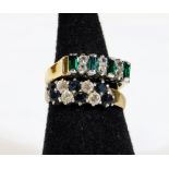 A dress ring, set with baguette cut green and small white stones, on a plain shank, marked, size