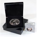 A cased five pound fine silver proof edition Queen Elizabeth II Trisdan Da Cunha coin, 7cm diameter,