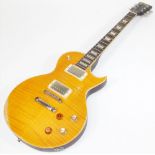 A Vintage brand Les Paul style electric guitar, in honey burst style finish, with relic