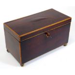 An early 19thC mahogany tea caddy, of rectangular form with shield escutcheon, plain interior and