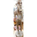 Various treen, a heavily carved tribal figure in standing pose 70cm high, brass plate, further