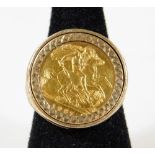 An Elizabeth II gold half sovereign 1987, in basket weave ring setting, size P, 8.5g all in.