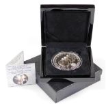 A cased five pound fine silver proof edition Queen Elizabeth II Trisdan Da Cunha coin, 7cm diameter,