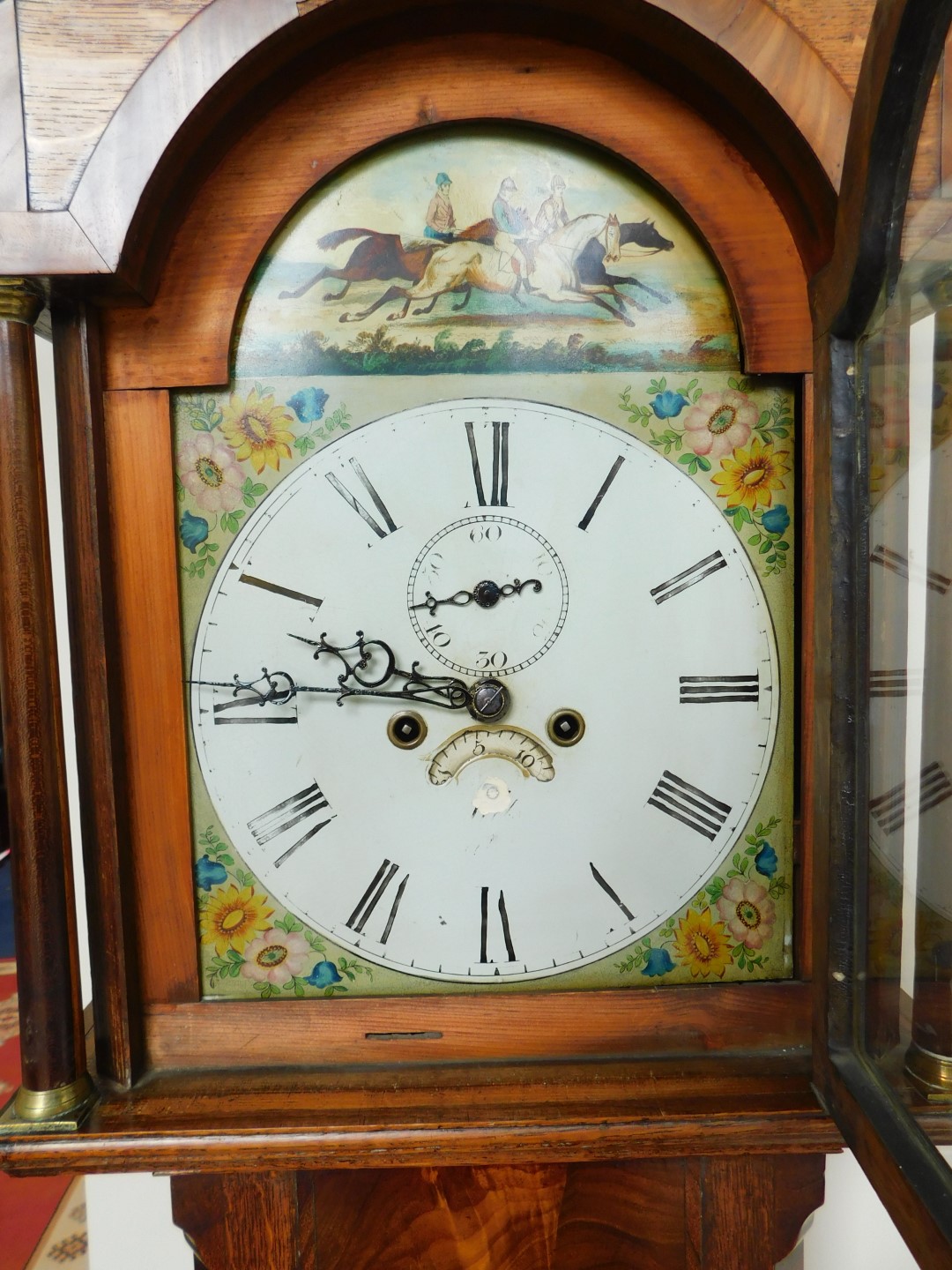 A George III oak and mahogany long case clock, the break arch dial painted with a horse race and - Image 2 of 3