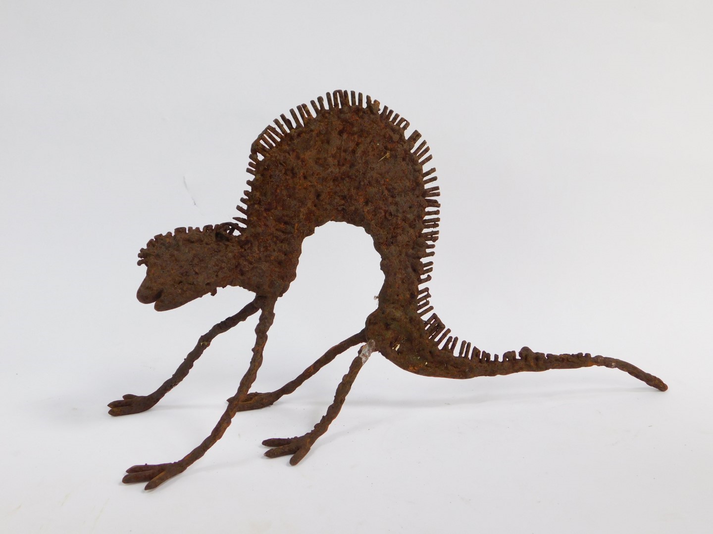 Andrew Thompson (British, 20thC/21stC. A wrought iron sculpture modelled as the Chameleon, with