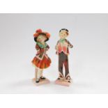 A pair of Royal Doulton figures modelled as Pearly Boy and Pearly Girl, HN2035 and HN2036.