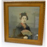 Japanese School (late 19thC). Half length portrait of a Geisha Girl holding a fan, print on silk,