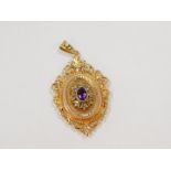 A 9ct gold amethyst and diamond locket pendant, of oval form with a central star burst, within an