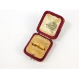 A 22ct gold wedding band, size K, 4.4g.