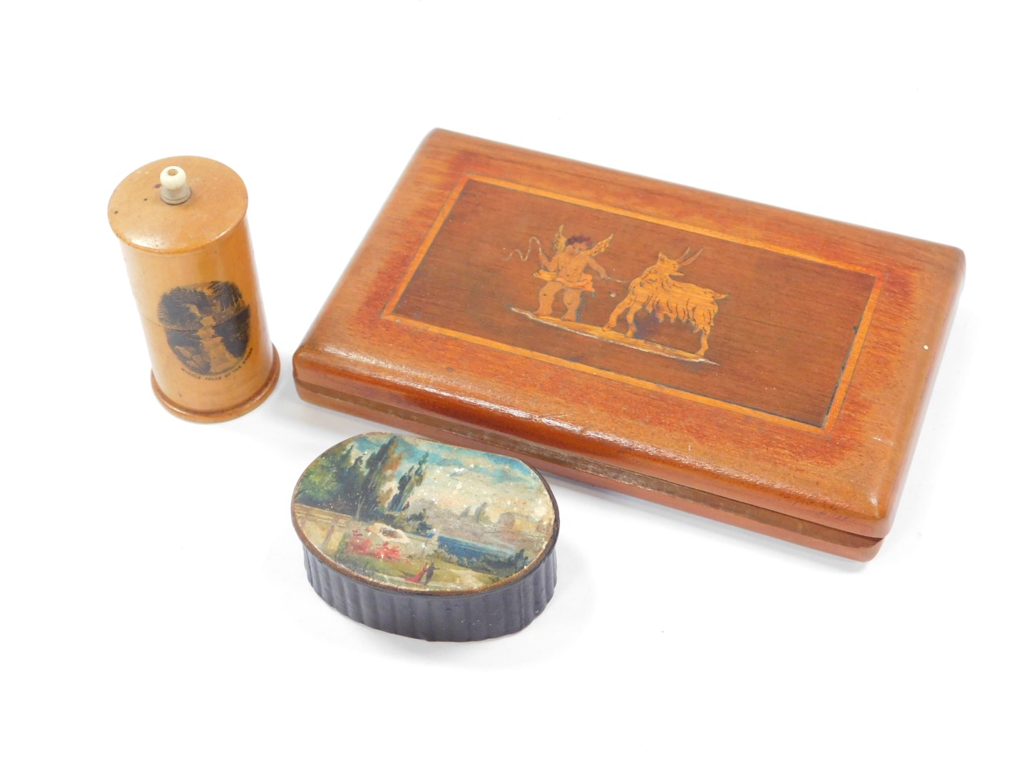 A Neapolitan Olive wood and inlaid cigarette box, marquetry inlaid to the lid with a cupid pulling a