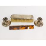 A George V silver backed clothes brush, Birmingham 1922, silver mounted comb, Birmingham 1963, and