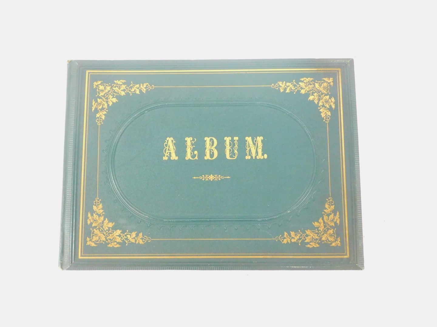 A Victorian album, in green cloth with gilt decoration, containing a collection of botanical pressed