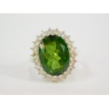 A silver fern green quartz and white topaz ring, claw set, topaz 9.22cts, size N/O, with