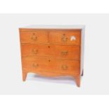 A George III oak chest of two short over two long drawers, raised on bracket feet,80cm H, 86cm W,