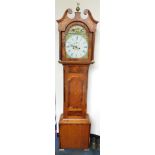 A George III oak and mahogany long case clock, the break arch dial painted with a horse race and