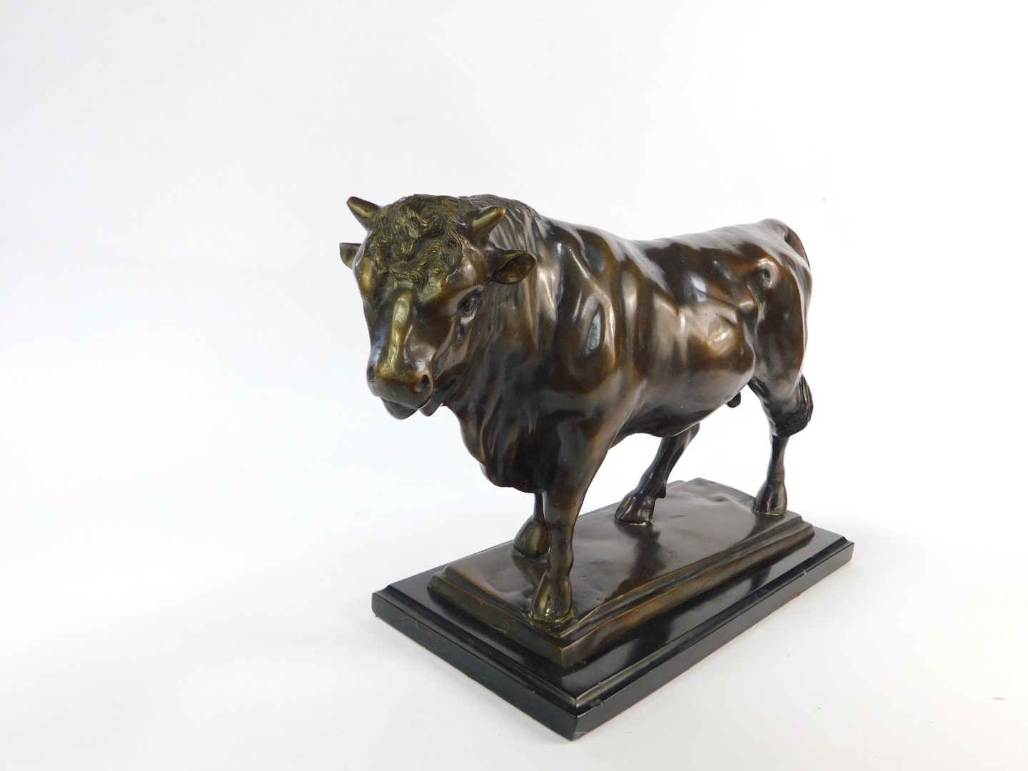 A bronze cast figure of a bull, modelled in standing pose, on a rectangular base, raised on a - Image 2 of 3