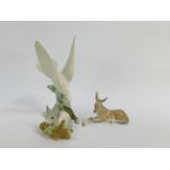 A Lladro porcelain figure of a bird, modelled on a bough, 27cm high, together with an ass 16.5cm
