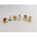 Six Royal Albert Beatrix Potter figures, comprising Rebeccah Puddle-Duck, Mrs Tiggywinkle takes tea,