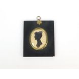 A 19thC silhouette portrait of a lady, attributed verso as Mrs Edward Whitemell, framed, 72mm x