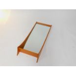 A Danish teak wall mirror with shelf, possibly Pedersen & Hansen, 112cm H, 44cm W.