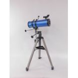 A Nikon Sky-Watcher telescope, with coated optics, on a tripod base, D=114mm, F=1000mm.