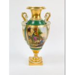 A 19thC Paris porcelain vase, of baluster form with twin sea serpent handles, reserve painted with a