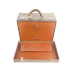 A veterinary surgeon's early 20thC leather three drawer chest case, containing medical equipment,