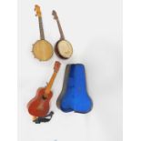 A Mahalo ukulele, U-20T, a Dulcetta banjo ukulele, further banjo ukulele, and a banjo case. (4)