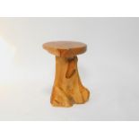 A carved driftwood stool or occasional table, 47cm H, 41cm Dia.