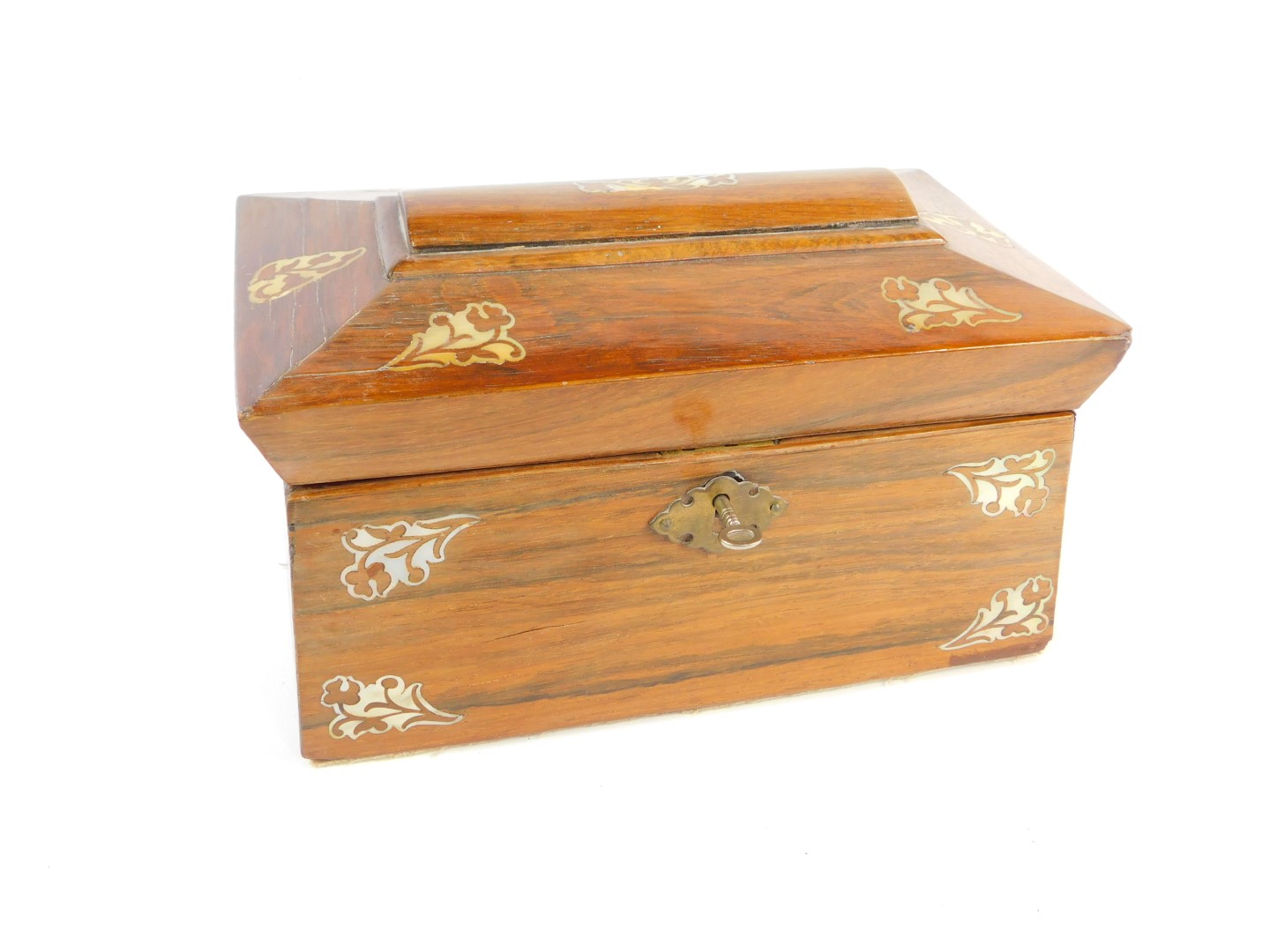 A Regency rosewood and mother of pearl inlaid tea caddy, of sarcophagus form, with floral