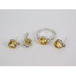 A silver Rio Grande citrine and white topaz jewellery set, comprising ring, size O, pendant and pair