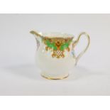 A Shelley porcelain cream jug decorated in the Sheraton pattern, No 13290, printed marks.