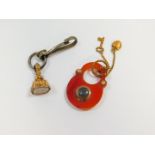 A red agate padlock form hair locket pendant, with heart and key attachments in yellow metal,