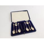 A set of six Edward VII silver coffee spoons, together with sugar tongs, cased, Birmingham 1906, 2.