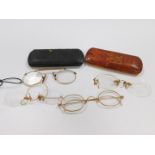 Three pairs of Victorian gold spectacles, stamped 10/12ct, and a pair of gold plated prince-nez.