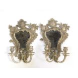 A pair of Continental baroque style pewter girandoles, 31cm W, 46cm D.