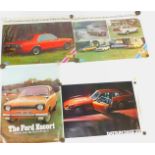 Five 1970's car posters, comprising Datsun 100A two door sedan, Ford Escort, Datsun 260Z 2+2, Ford