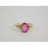 A 9ct gold pink fluorite and diamond ring, claw set, size L/M, 1.72g gold, with certificate.